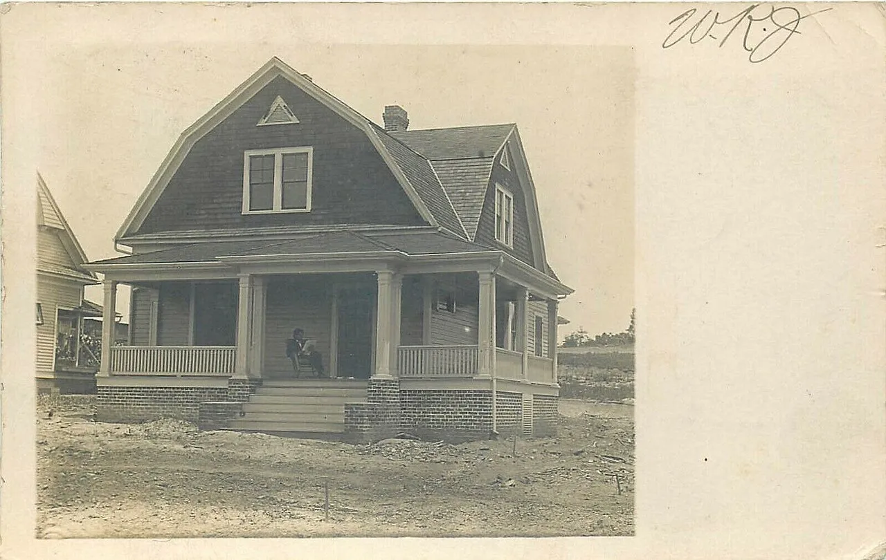 (1) A real-photo postcard of a street