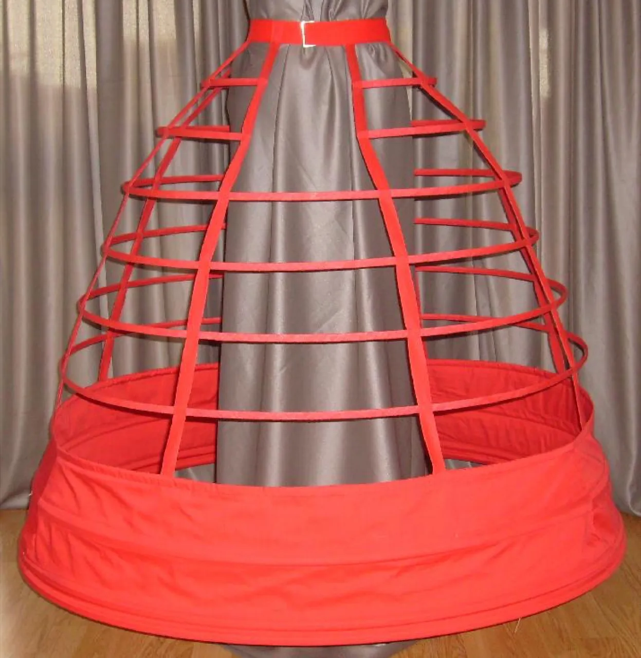 A cage crinoline: steel hoops on tapes